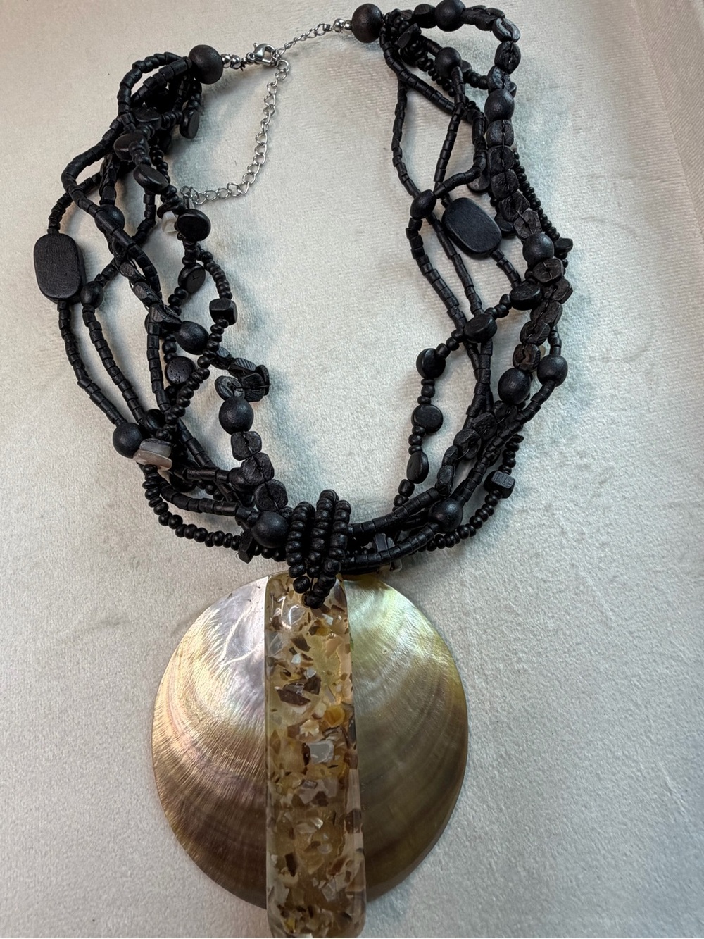 Handcrafted Black Beaded Necklace with Shell Pendant